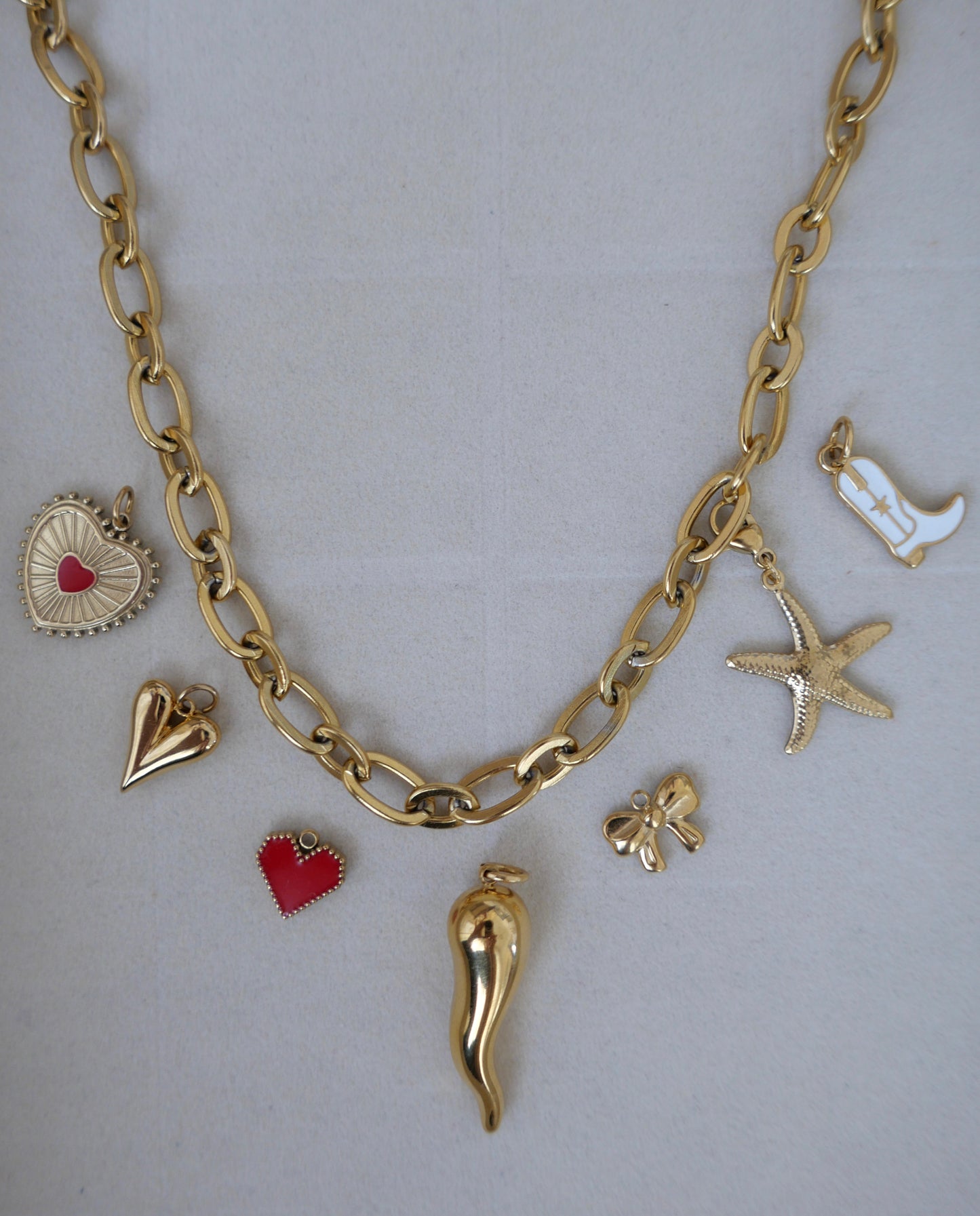 Gold heart charm 21